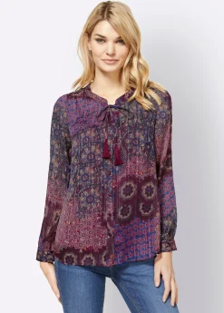 Druckbluse mit Quaste am Ausschnitt
