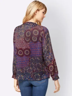 Druckbluse mit Quaste am Ausschnitt