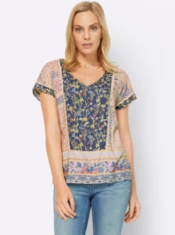 Druckbluse mit Spitzeneinsätzen