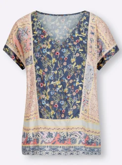 Druckbluse mit Spitzeneinsätzen