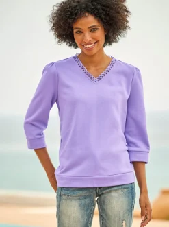 Sweatshirt mit Spitze am V-Ausschnitt